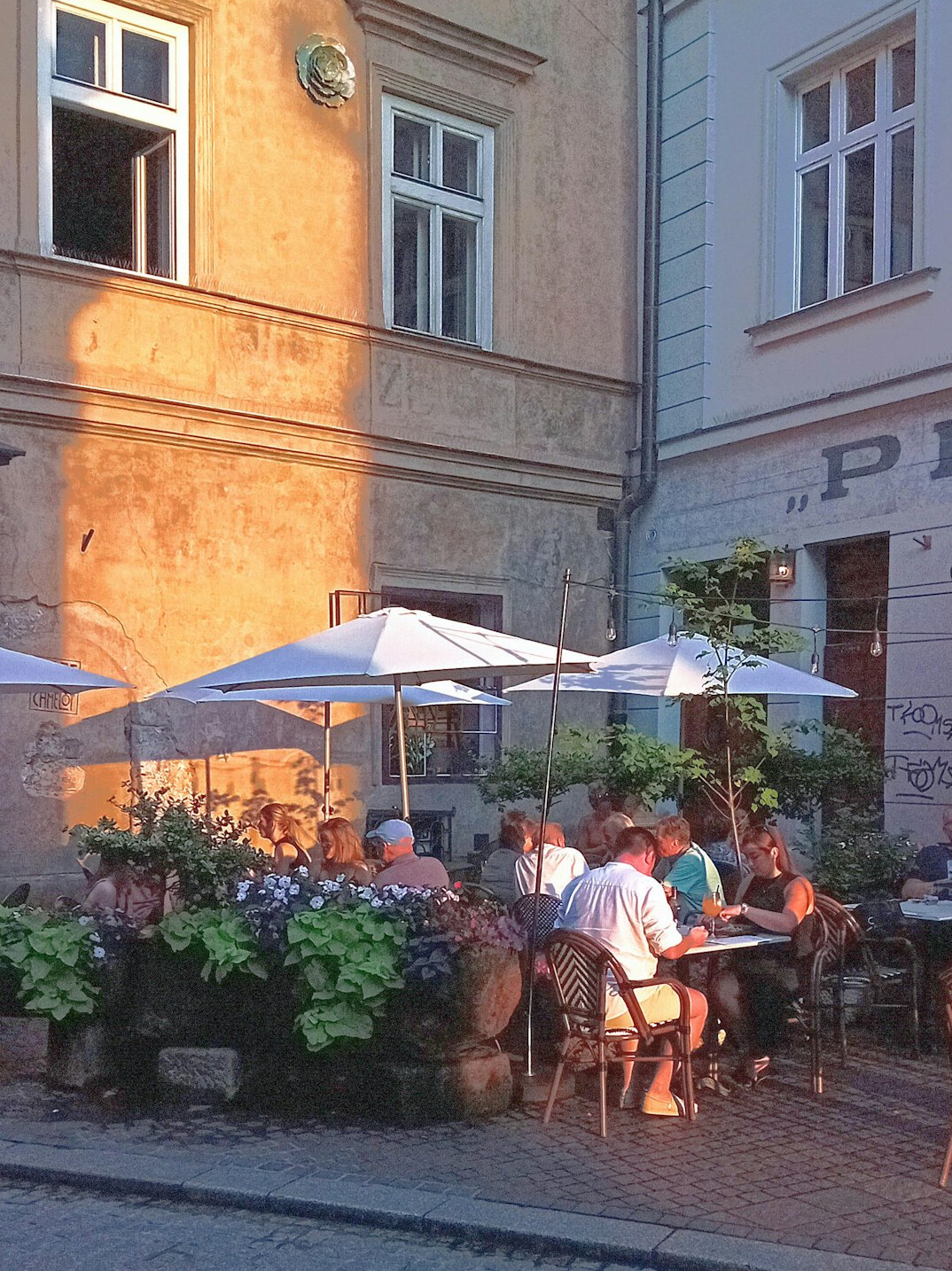 Local residents gathered at an outdoor market in a small Polish town